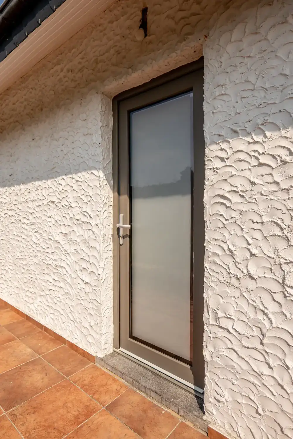 Maison à Paliseul — porte vitrée