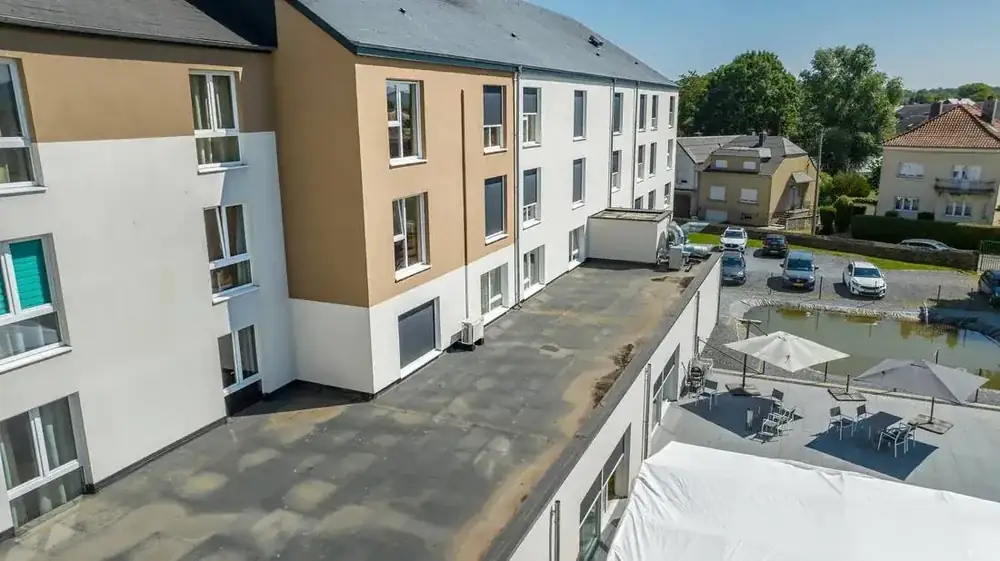 Appartements à Aubange — façade arrière et terrasse