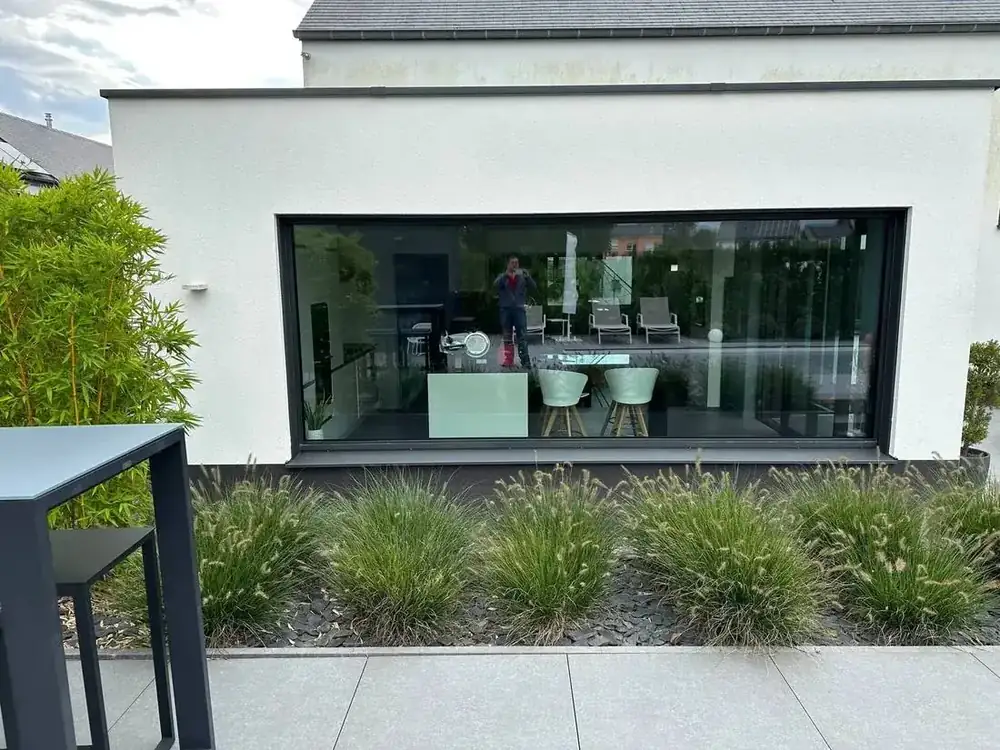Maison à Arlon — grande baie fixe panoramique